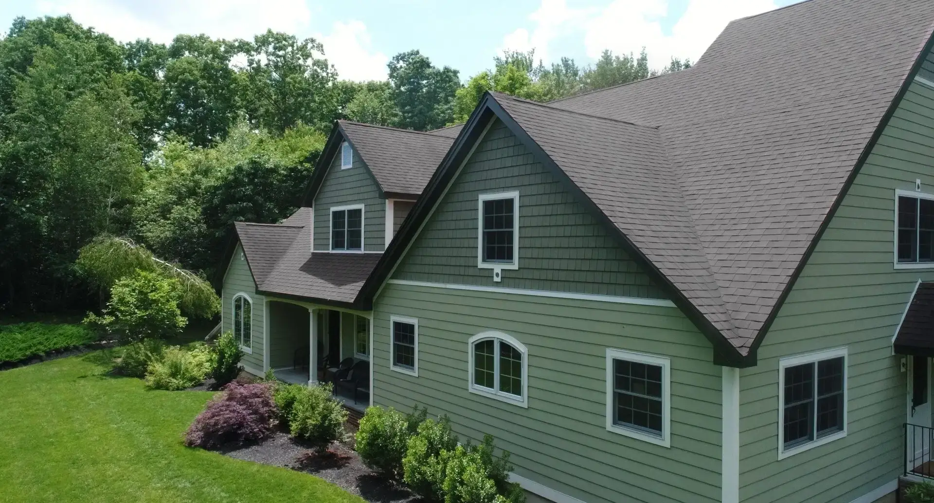 Newly remodeled home with a new roof and gutters in Massachusetts